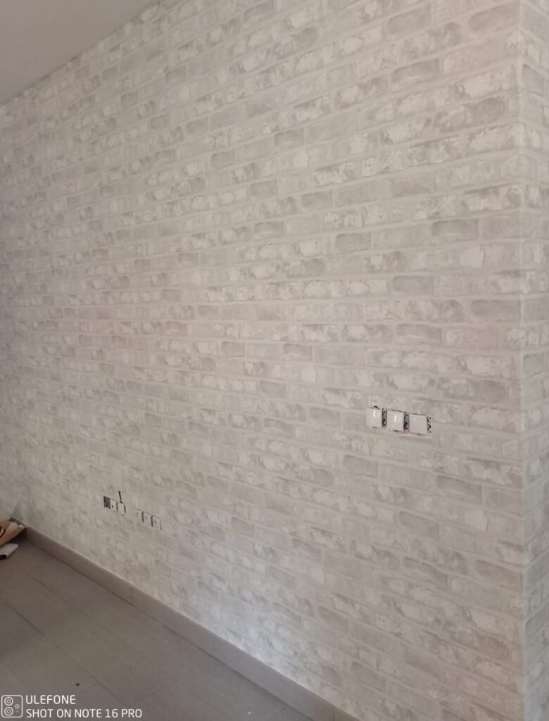 papel pintado imitación ladrillo gris